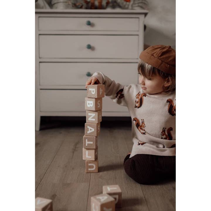 beige Gebreide trui met eekhoornmotief voor groothandel op Faire4