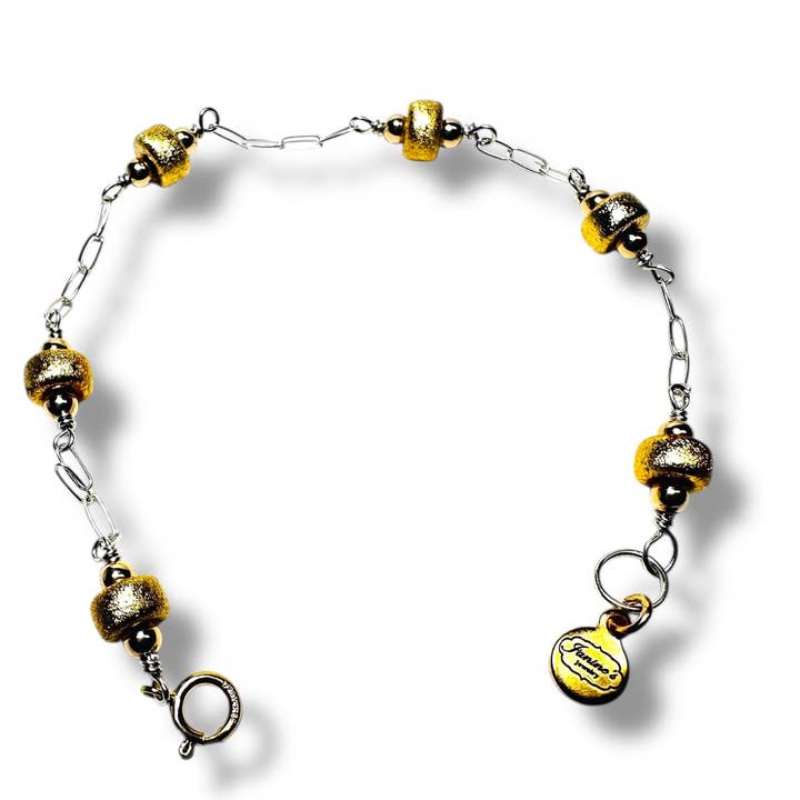 Bracelet en or et argent pour la vente par Janine’s Jewelry Design