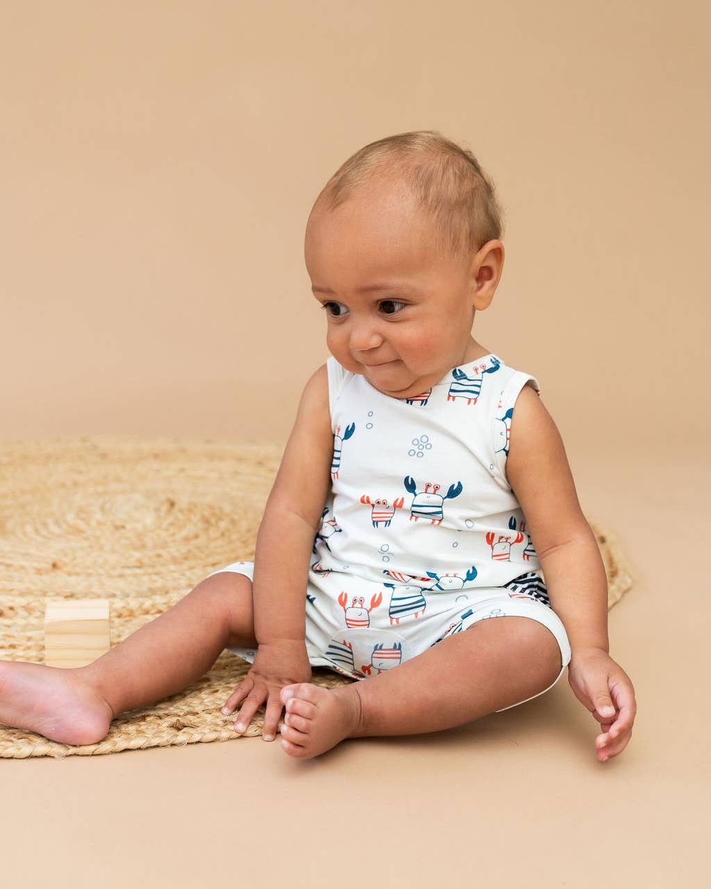 NATURAL Nautical Crab Side Pocket Baby Romper (Organic Jersey) for wholesale on Faire1