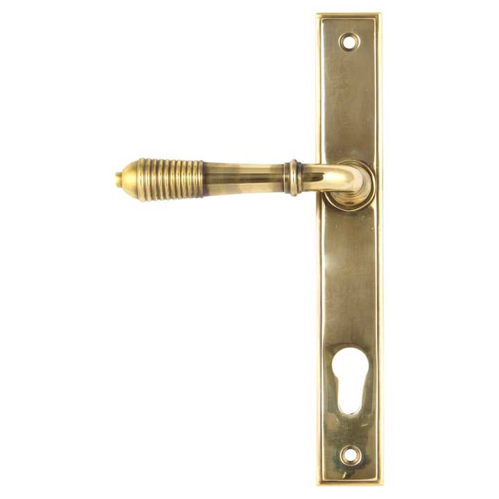 From The Anvil Reeded Slimline Door Handle - Euro - 92mm c/c - Aged Brass for wholesale by Diybasket