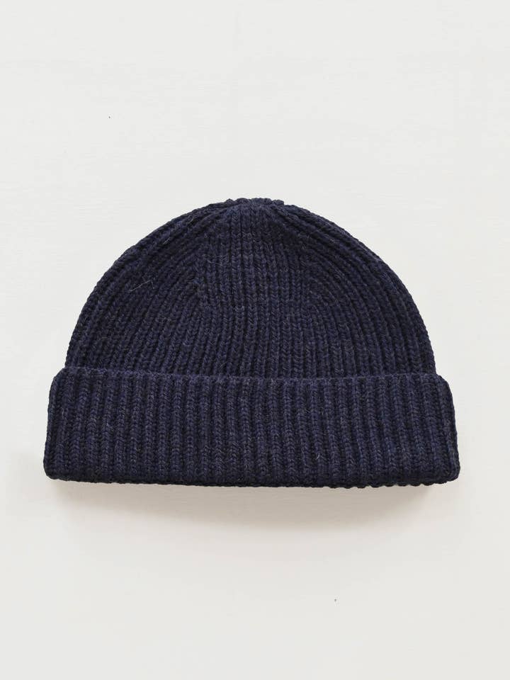 Brittisk ullmössa i marinblått för wholesale av OUBAS