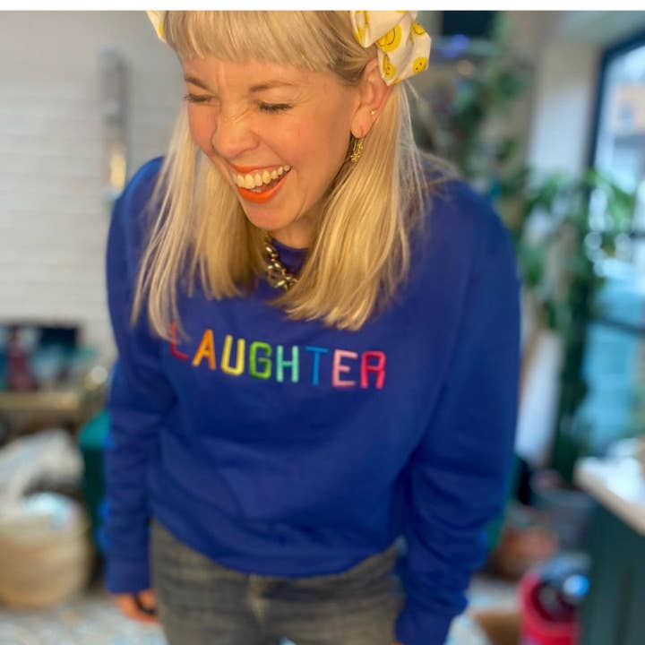 2026 Sample Sale - Laughter Embroidered on Royal Blue Sweatshirt - LARGE for wholesale by Percy and Nell Retail Limited