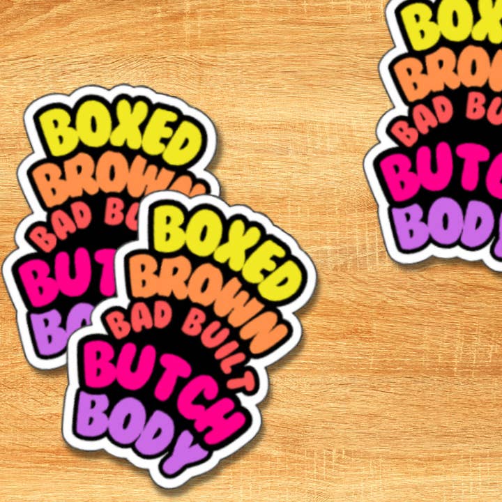 Autocollant pour le corps Bad Built Butch brun en boîte pour la vente par Agave Creative LLC