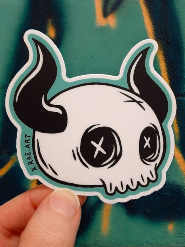 Cute Devil Skull Logo Vinyl Sticker for wholesale by XRAEART Clothing Co