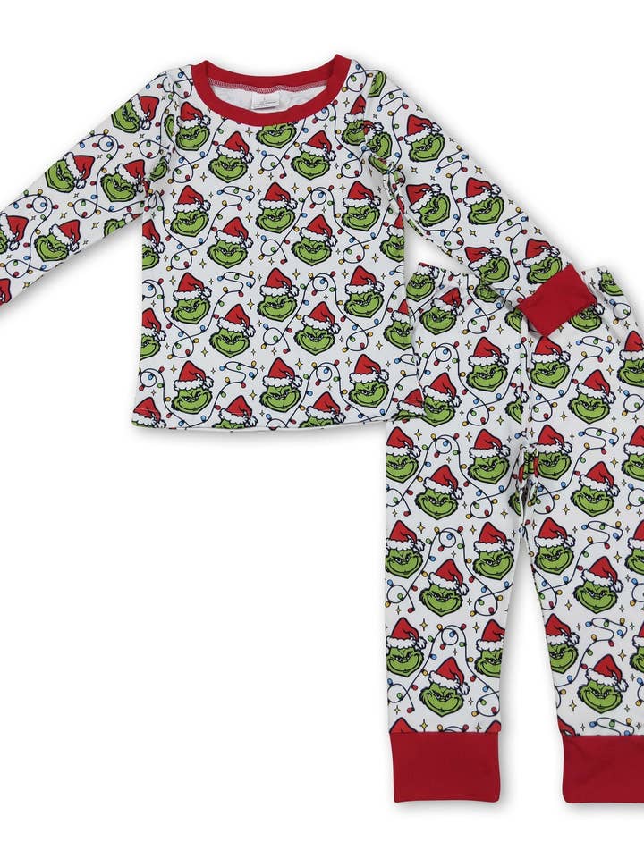 Christmas lighting green face baby kids pajamas and other Purchase Wholesale grinch pjs. Free Returns & Net 60 Terms on Faire trending on Faire.