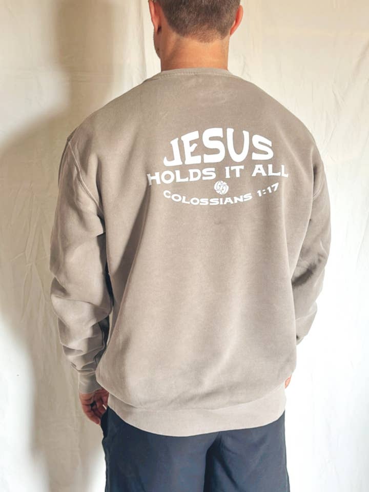 Jesus Holds It All Crewneck Sweatshirt for wholesale by Ruth Artistry & Decor LLC