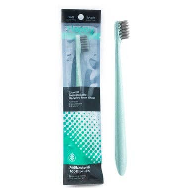 HAPPY BIODEGRADABLE CHARCOAL TOOTHBRUSH - 1 unit for wholesale by Happy Natural Products