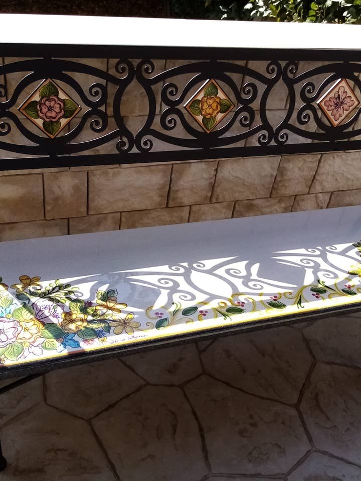 Wrought-iron bench with lava stone and 10x10 cm tiles, floral decoration for wholesale by DD Ceramiche Siciliane