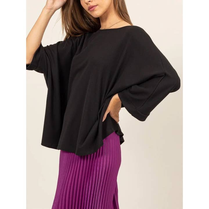 TOP OVERSIZE CON SCOLLO TONDO E MANICHE DOLMAN per la vendita all'ingrosso da parte di Apolline