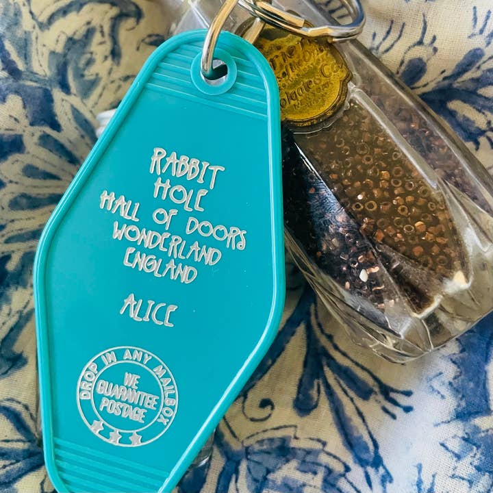 Motel Key Fob - Rabbit Hole (Alice in Wonderland) for wholesale by The 3 Sisters Design Co.