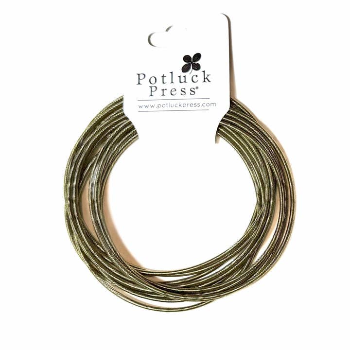 Bracelet, guitar string for wholesale by Potluck Press