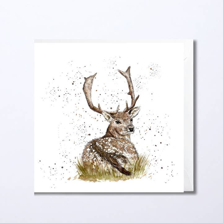 Watercolour Stag Sitting in Snow Greeting Card for wholesale by Dots Allowed