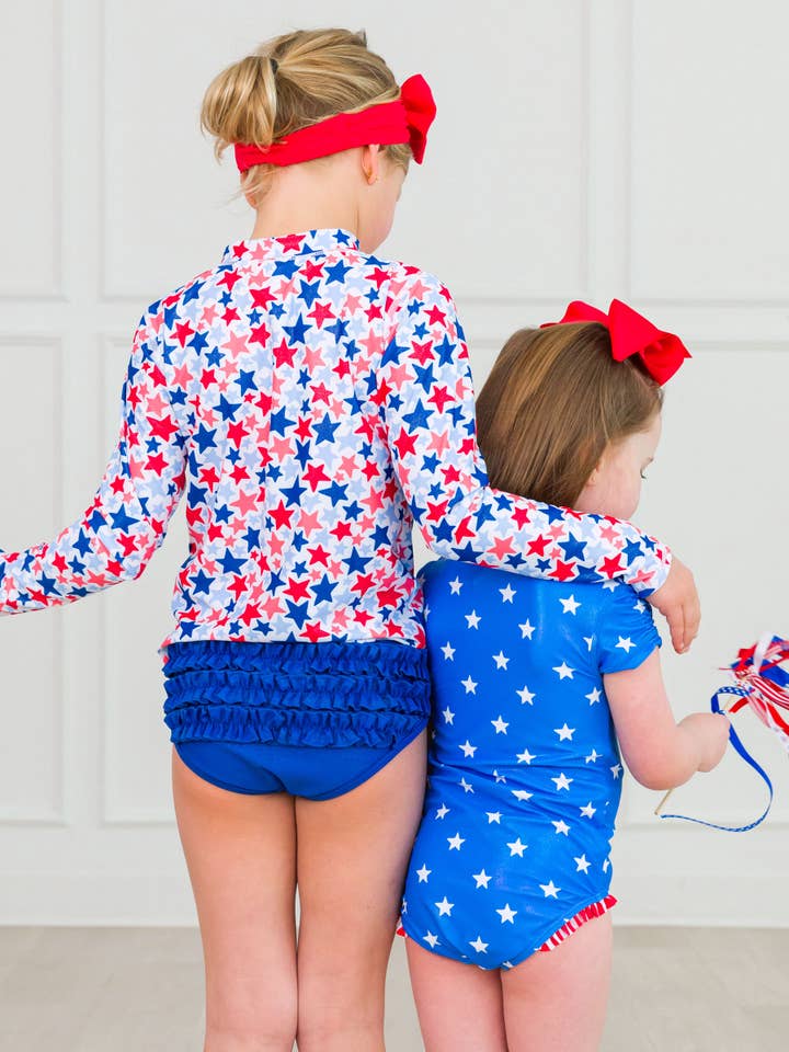 Multi Color Girls Shimmer Star-Spangled Long Sleeve Zipper Rash Guard 2-Piece Swimsuit with Signature Rear Ruffles
for wholesale on Faire