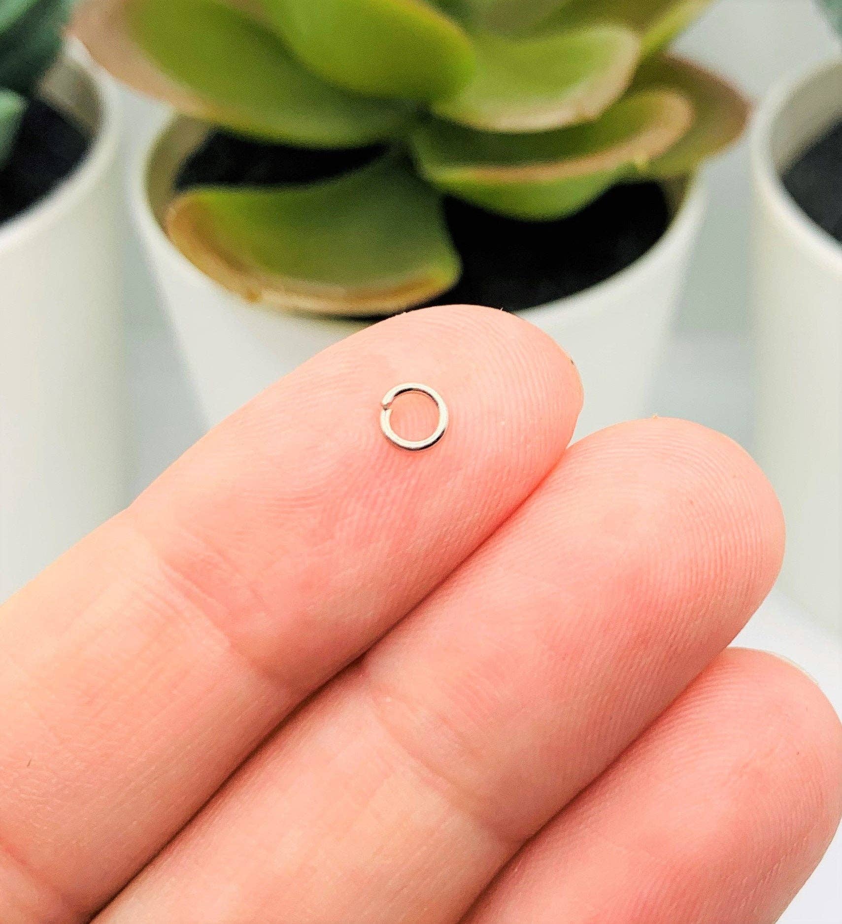 Guerrilla Charm - Wholesale Craft Supplies - 4mm, 21g, Antique Silver Open Jump Rings1