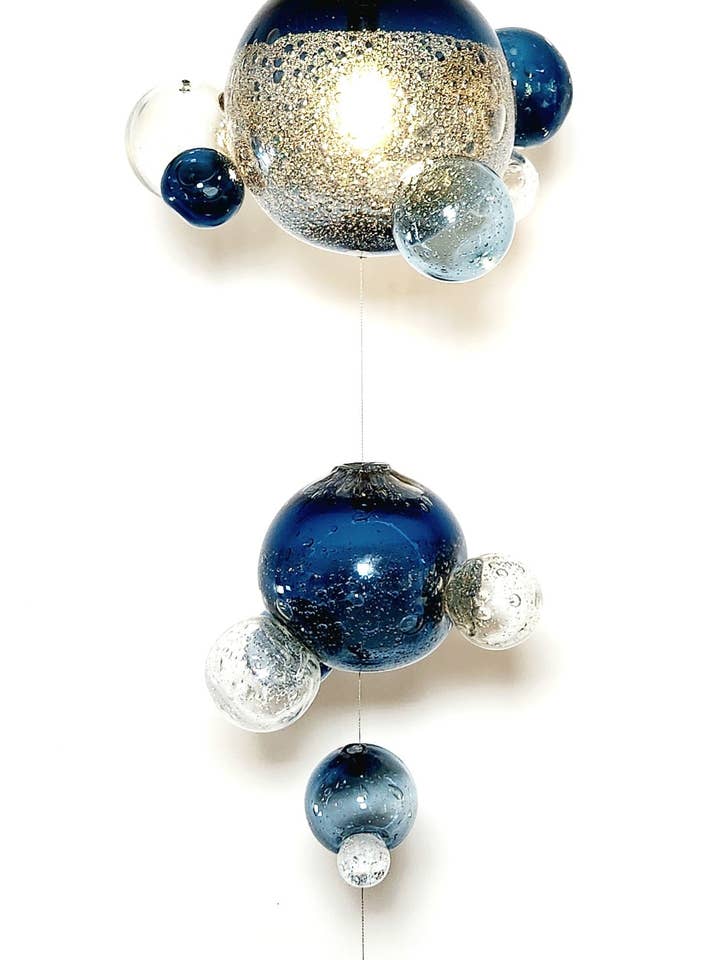 Celestial Chandelier for wholesale by furthurdesign