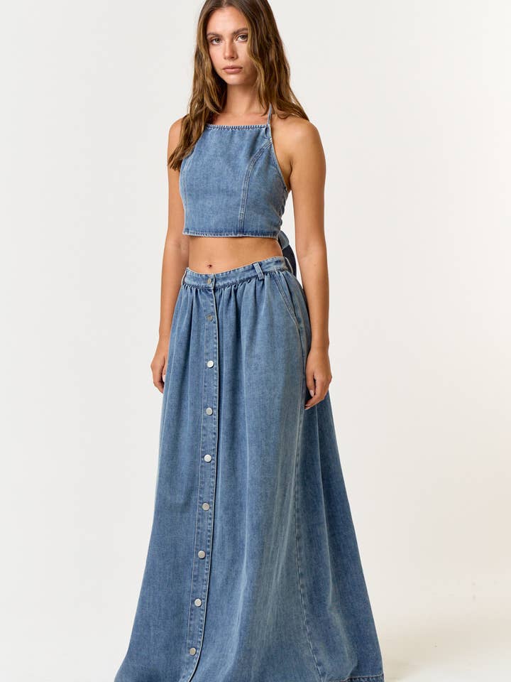 MEDIUM WASH IBS30944 DENIM HALTER BACK TIE CROP TOP AND MAXI SKIRT SET for wholesale on Faire