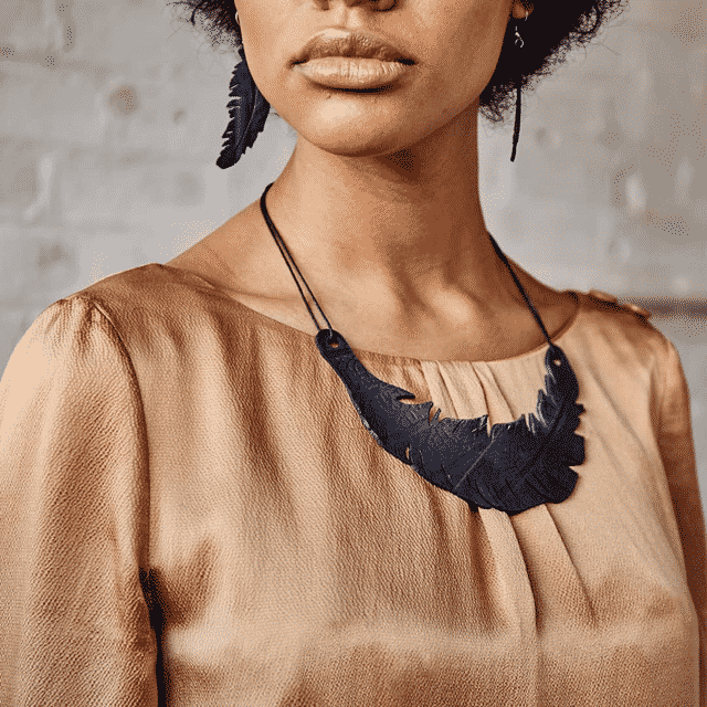 paguroupcycle – wholesale Pendant/charm necklace – Angel Inner Tube Feather Necklace1