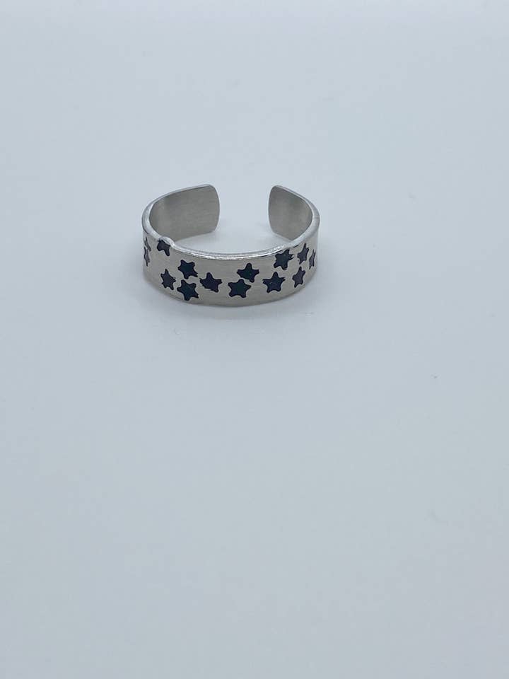 Anillo estampado estrellas para venta al por mayor de aroundloveco.