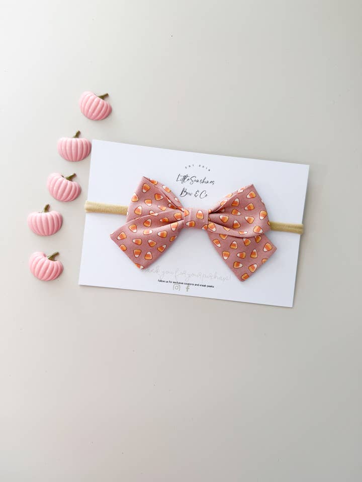 Pink Candy Corn Halloween Pinwheel Hair Bow for wholesale by Little Sunshines Bow & Co