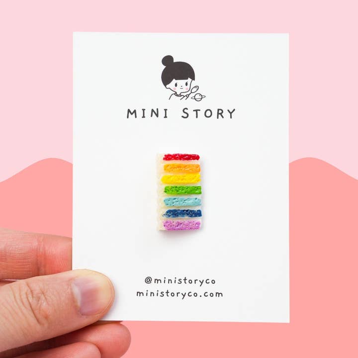 Rainbow Cake Pin | Rainbow Cake Slice Brooch | Pride Flag Rainbow Cake Accessories | LGBTQA+ Pins | Miniature Cake Pin for wholesale by Mini Story Co