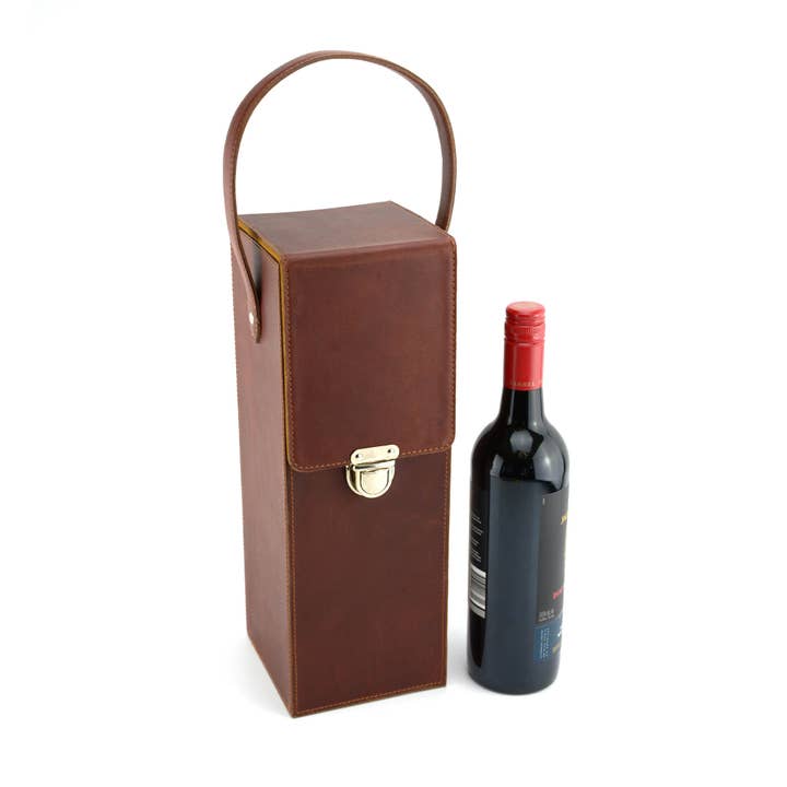 Wine Bottle Carrying Case / Holder made from buff leather and other Purchase wholesale wine bottle holders. Free returns & net 60 terms on Faire trending on Faire.