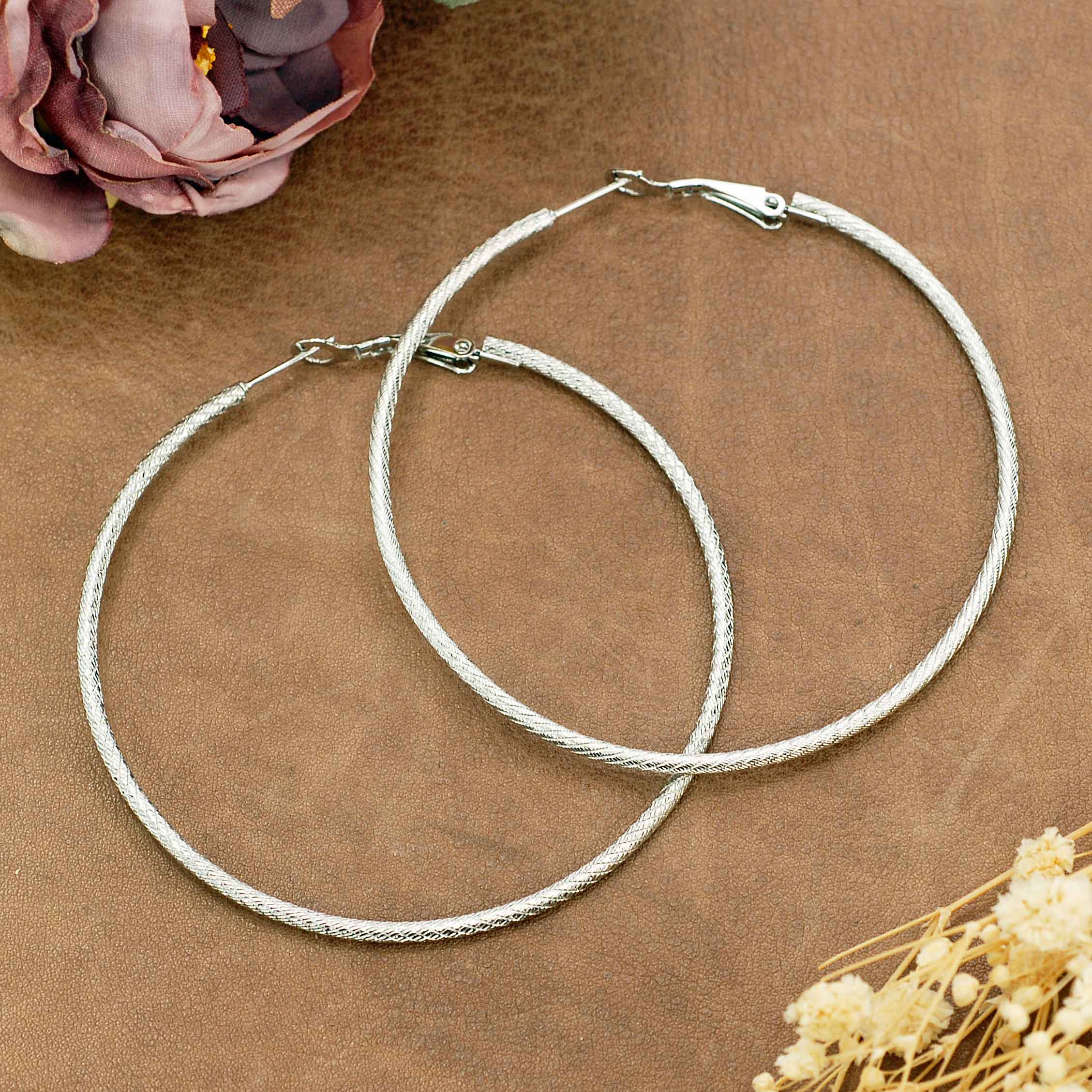 Merveilles du Monde - Wholesale Jewelry Set - Set of 16 pairs of stainless steel hoop earrings15