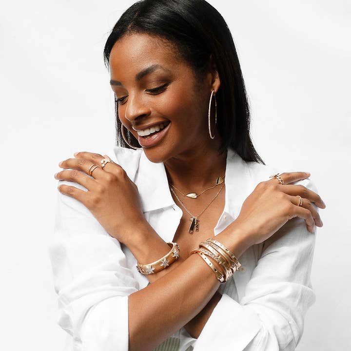 gold pave starburst statement bangle for wholesale on Faire1