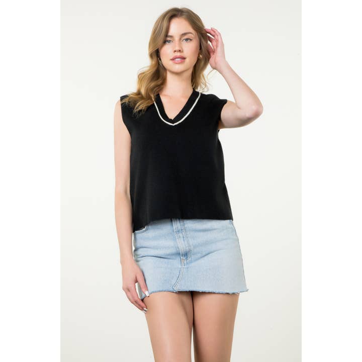 Haut en maille sans manches à col en V pour la vente par THML