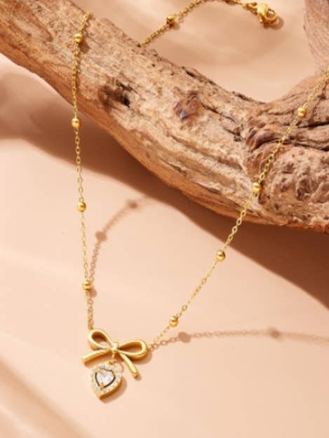 18K STAINLESS STEEL TARNISH FREE BOW NECKLACE | 40NK9507 for wholesale by JOSSLYN by wall to wall