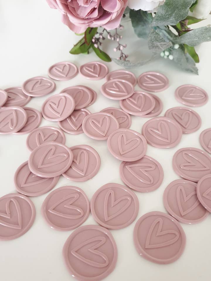 Pack of 100 Pink Heart Wax Seals for wholesale by littleaddedtouches