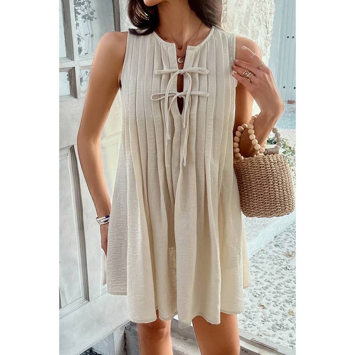 Mini-jurk met vaste stropdas, geplooid en mouwloos. voor wholesale door Elings