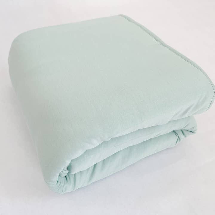 Bamboo Quilted Blanket in Tidewater for wholesale by NODNAL Co.