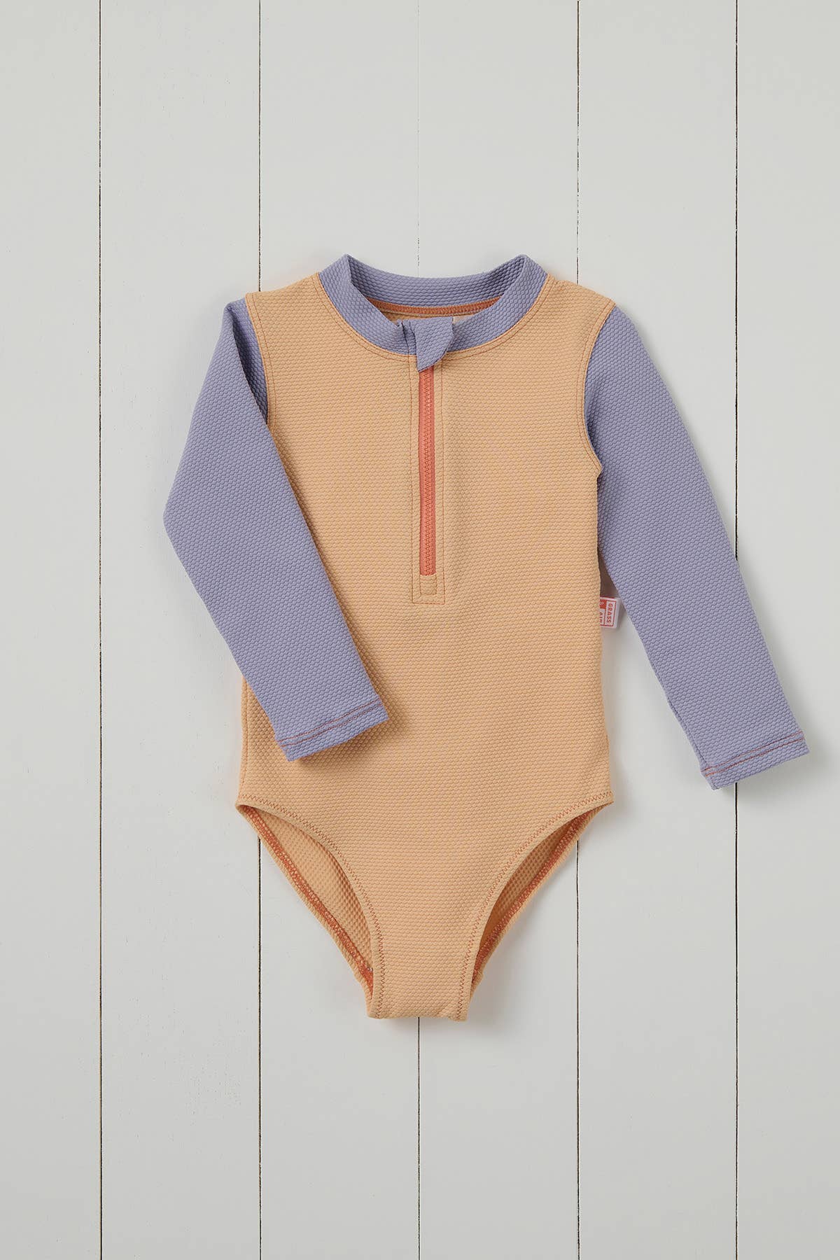 Peach Ribbed Kids Long Sleeve Swimsuit for wholesale on Faire0