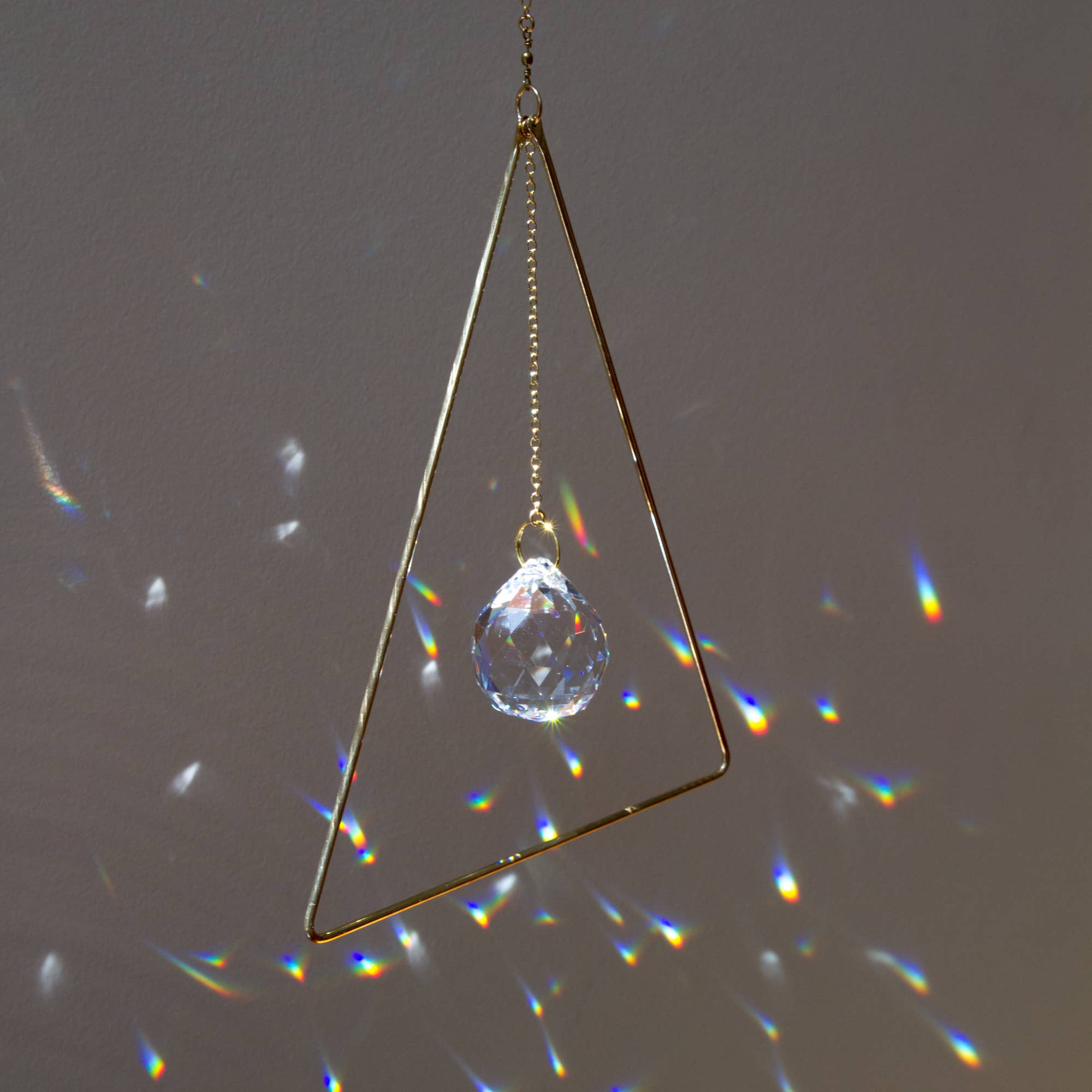 Sol Proaño - Wholesale Suncatcher - Prisma 21 Triangle Brass Suncatcher3