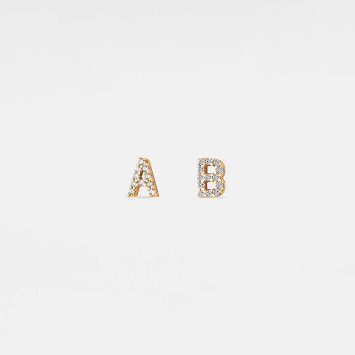 Tiny Initial Letter Stud Earrings in 925 Sterling Silver and other Purchase Wholesale initial earrings. Free Returns & Net 60 Terms on Faire trending on Faire.