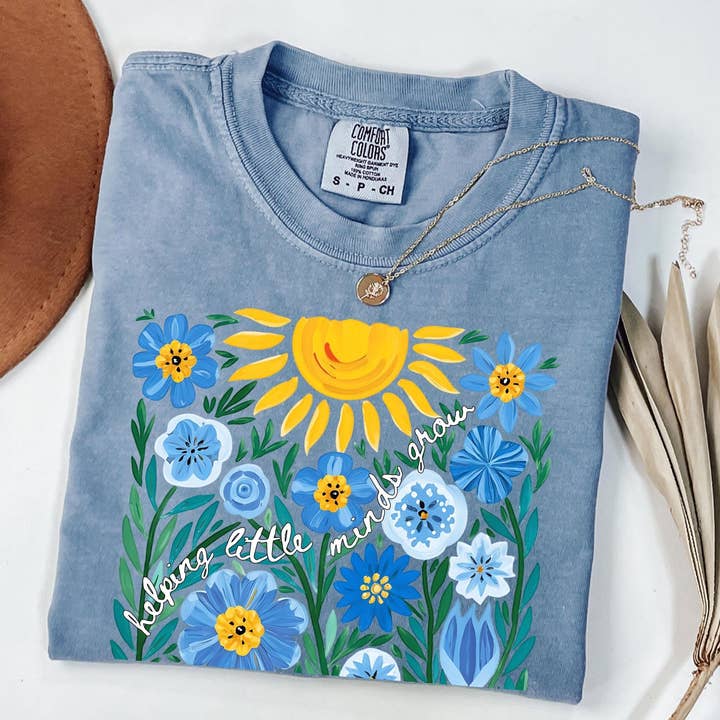 Camisola Comfort Colors Professor Ajudando Pequenas Mentes a Crescer por atacado de Glaime