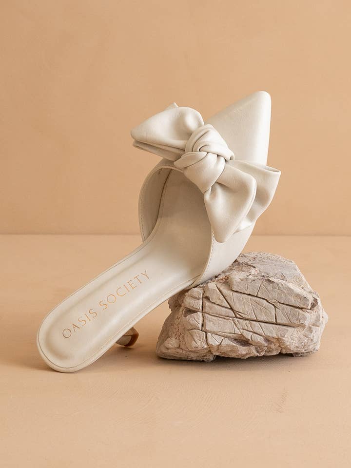 The Jane | White Pointed Toe Bow Accent Kitten Heel for wholesale on Faire