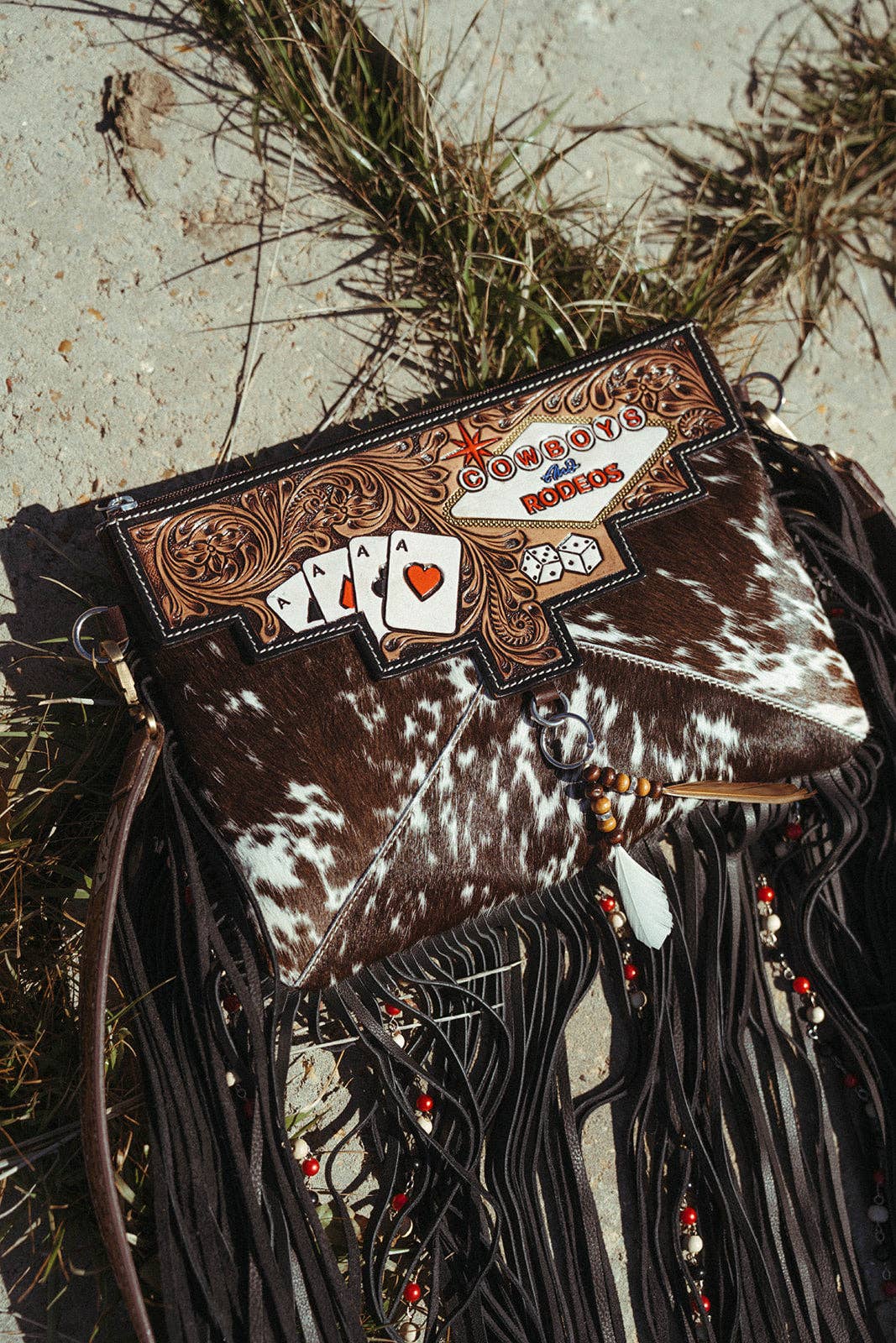 Haute Southern Hyde – Engroshandel Crossbodytaske - Dame – Cowboys og rodeoer En Haute Southern Hyde af Beth Marie Exclu1