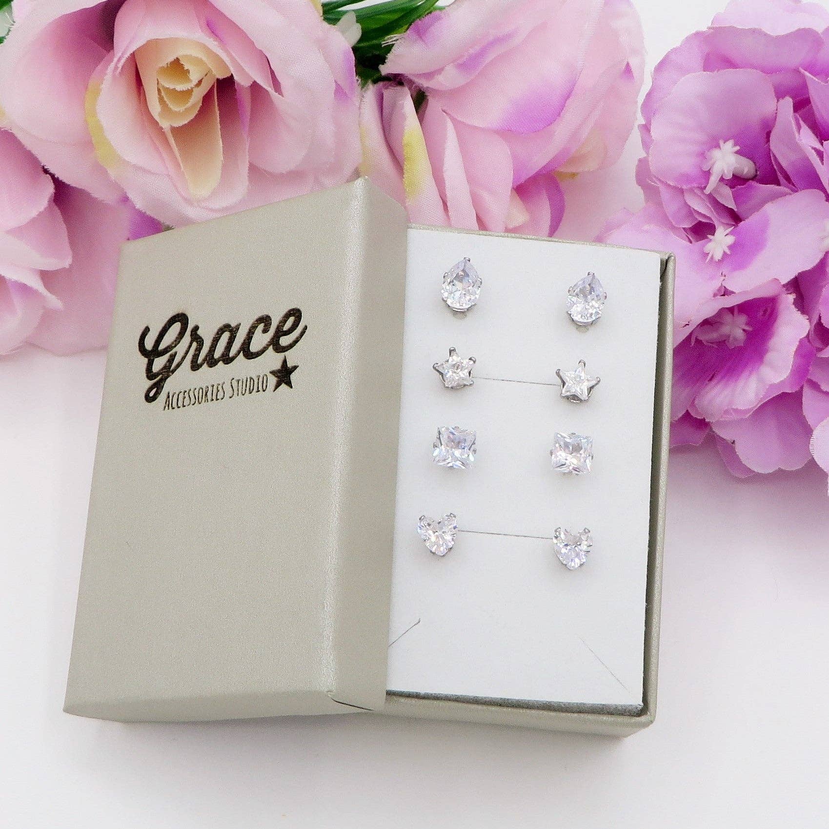 Daemon srls - Wholesale Jewelry Set - SET 4 PAIA PUNTI LUCE SHINE colours ~ 4 forme punti luce acciaio inossidabile ~ 8 PZ ~ 12 varianti colore ~ Orecchini a lobo con zirconi7