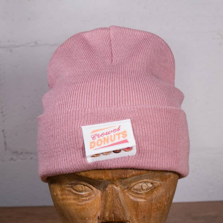 Crewel Dozen Donuts Beanie for wholesale by Crewel and Unusual