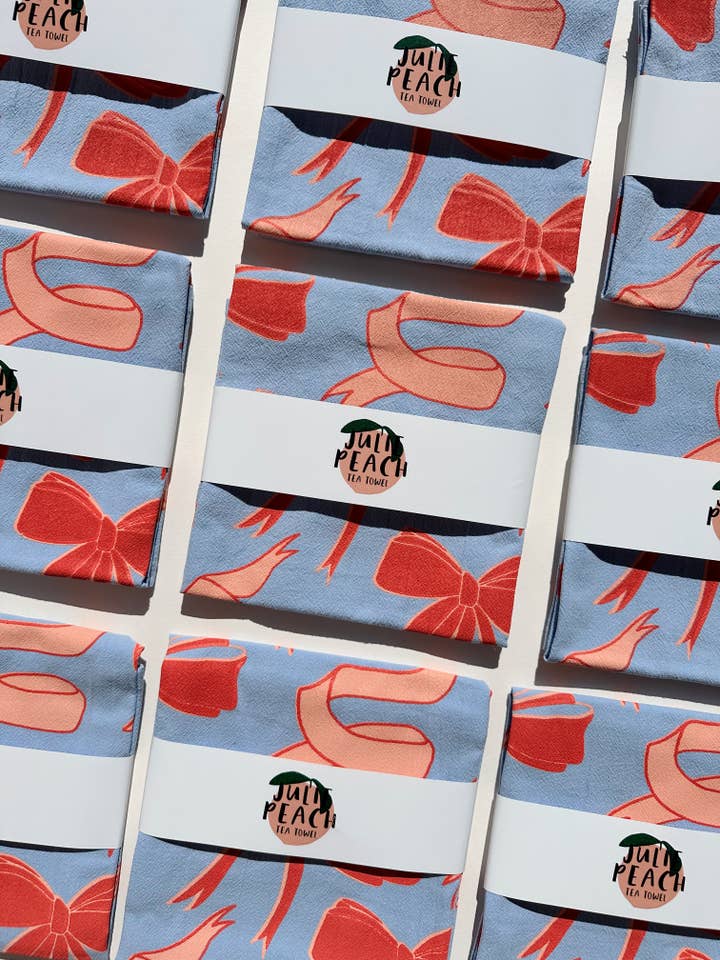 Bows on Blue Tea Towel - 100% Cotton for wholesale by Julie Peach