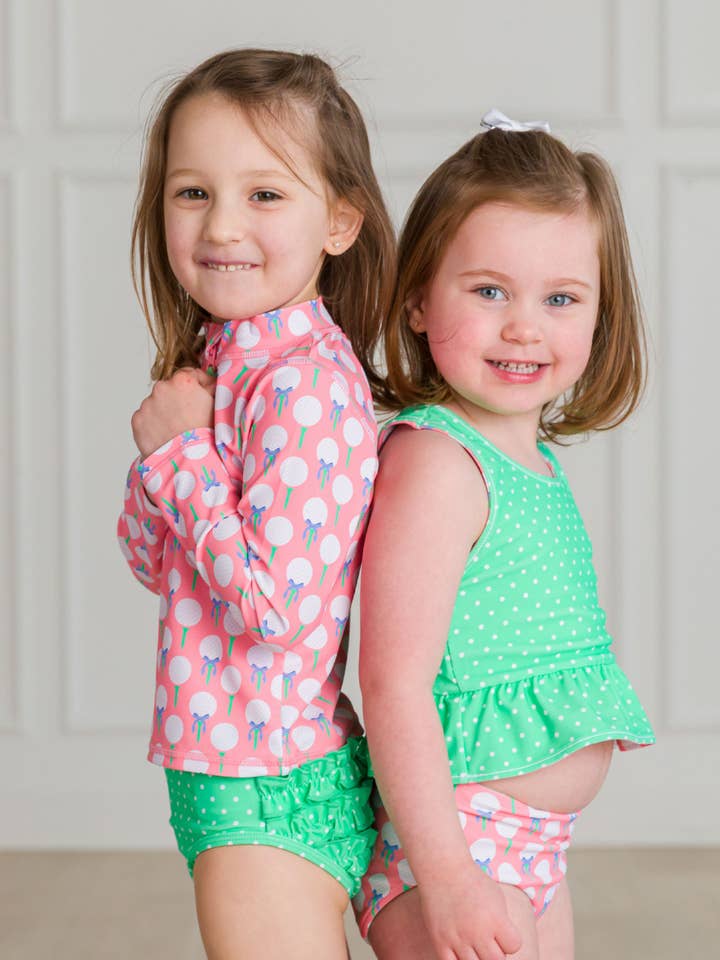 Girls Pink Tee Time Golf Long Sleeve Zipper Rash Guard 2-Piece Swimsuit with Signature Rear Ruffles
 for wholesale on Faire4