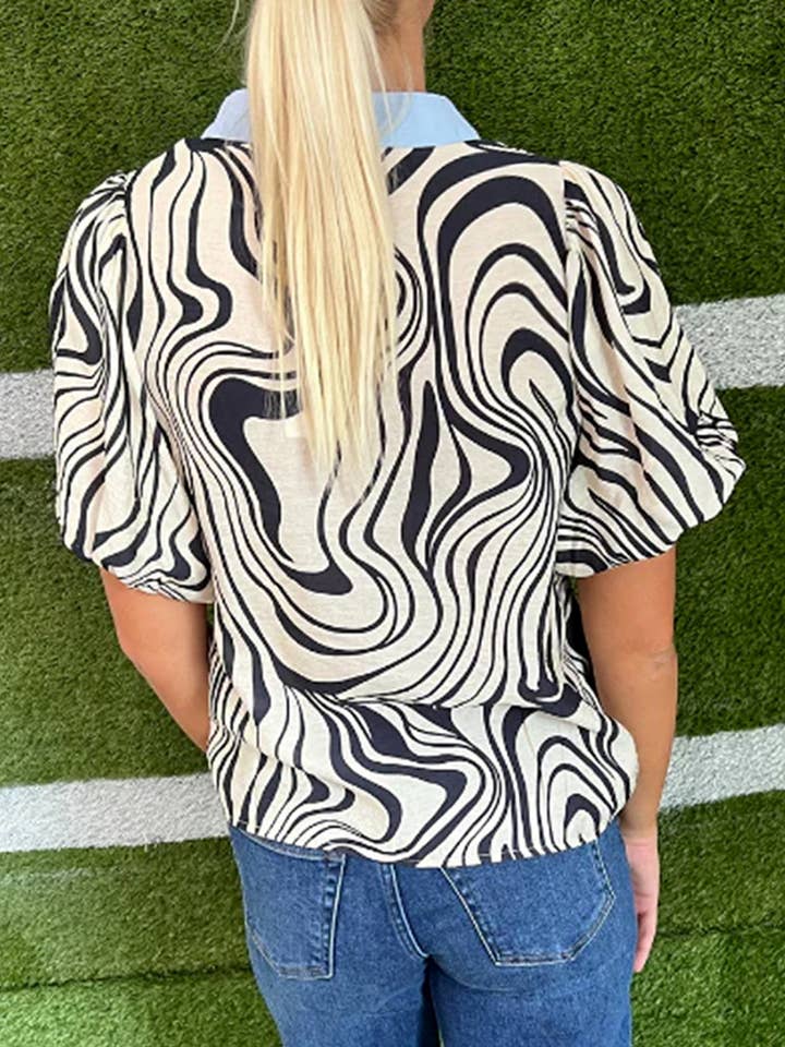 Animal Print Zebra Printed v-neck puff short sleeve blouse for wholesale on Faire1