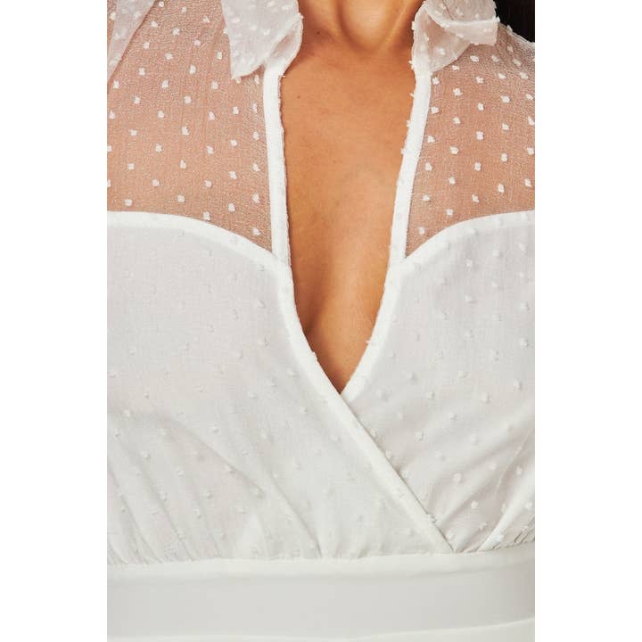 VIT SKIR ÄRMAD ELEGANT JUMPSUIT för wholesale på Faire4