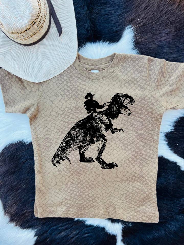Cowboy dinosaur for wholesale by Buckin Baby Wholesale
