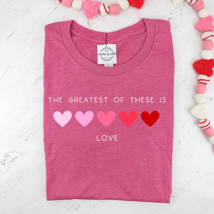 Greatest is of these is Love Valentines Day Graphic T-Shirt for wholesale by Faith & Life Christian Brands