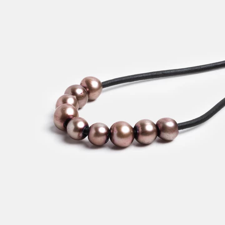 7-8mm plommon stora hål av runda pärlor 15 tum 60 bitar för wholesale av The Bead Traders