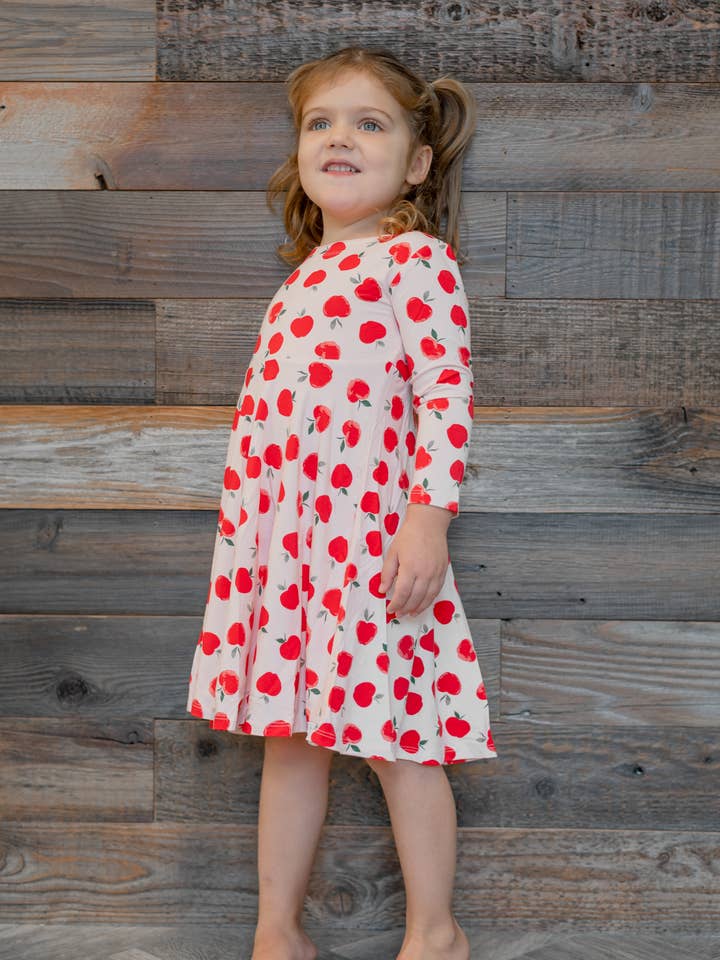 Swirly Girl Dress - Snow White for wholesale on Faire