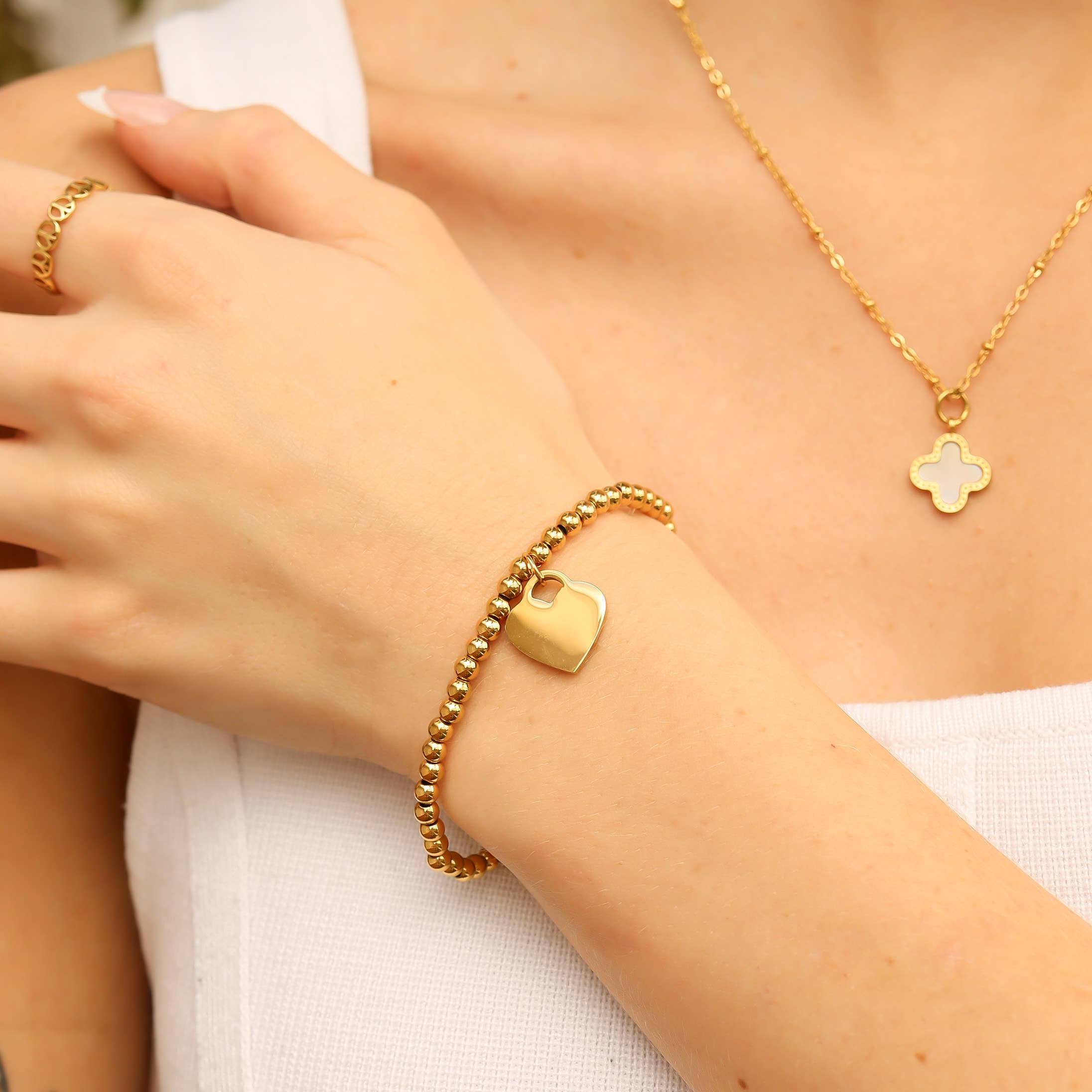 WJW - Wholesale Bedelarmbandje - 18K PVD-gecoate roestvrijstalen stretcharmband met hart en kralen3