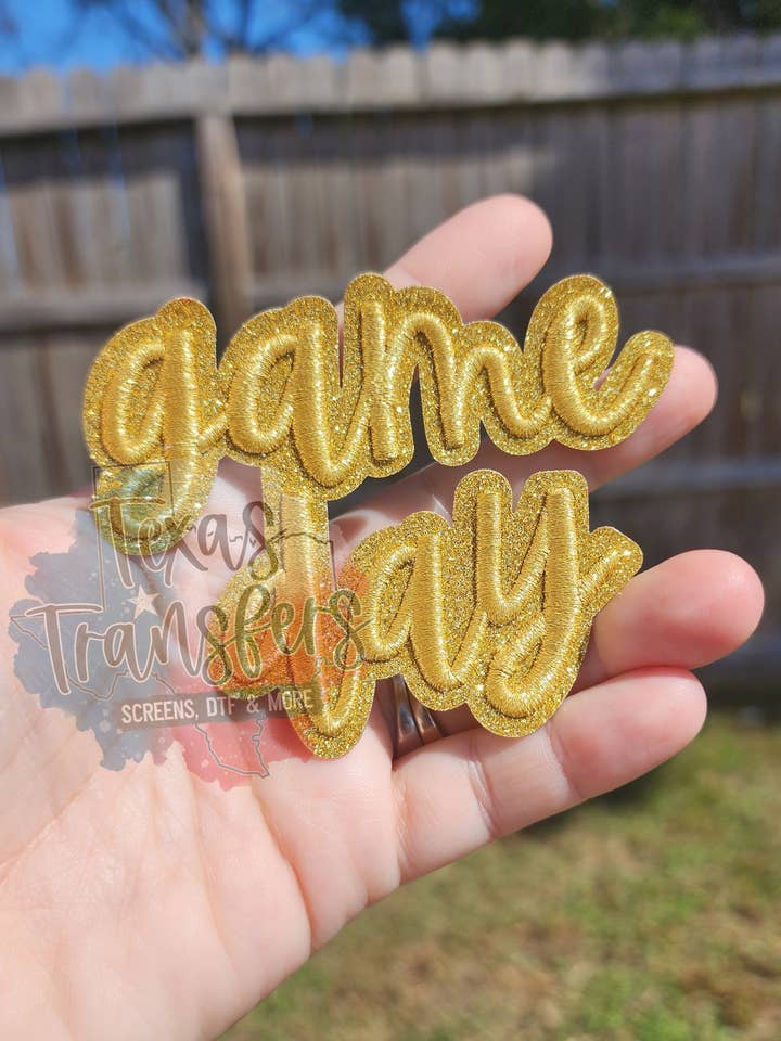 Game Day (Gold) Iron-On PATCH for wholesale by Texas Transfers